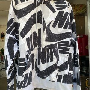 All over Nike hoodie. I don’t even think it’s been worn once.